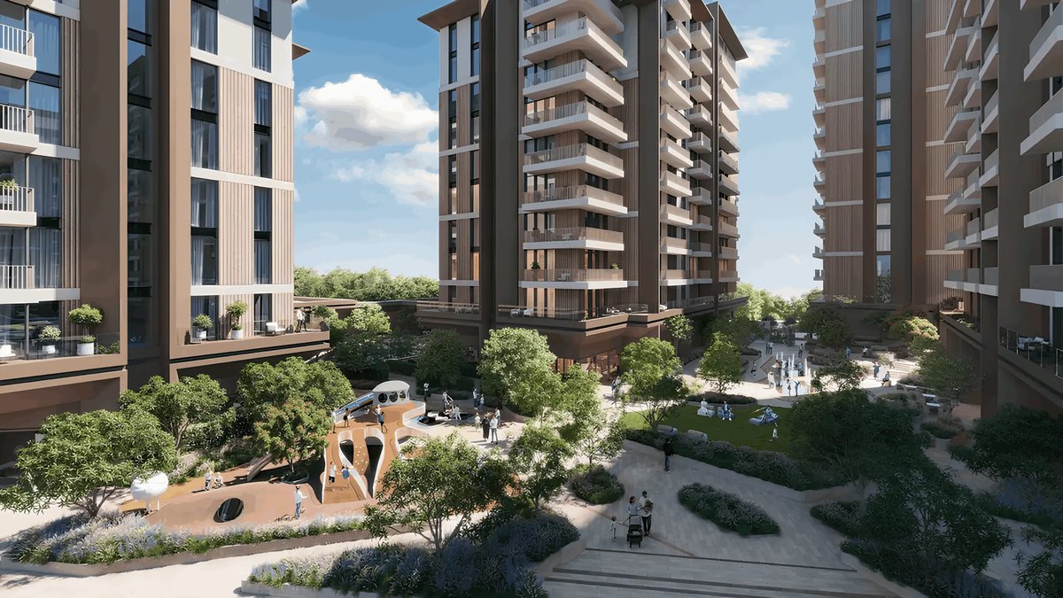 Landscaped courtyard and play area at Expo Valley Views — developer render