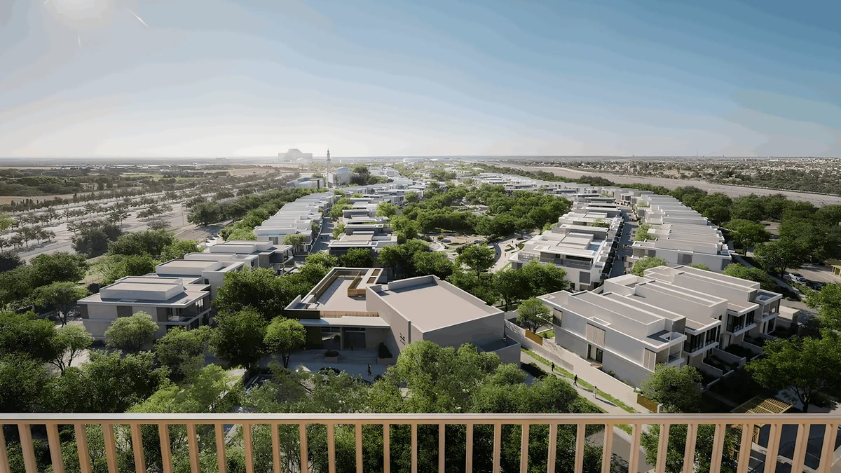 Balcony view over the low-rise homes around Roudah at Expo Valley Views — developer render